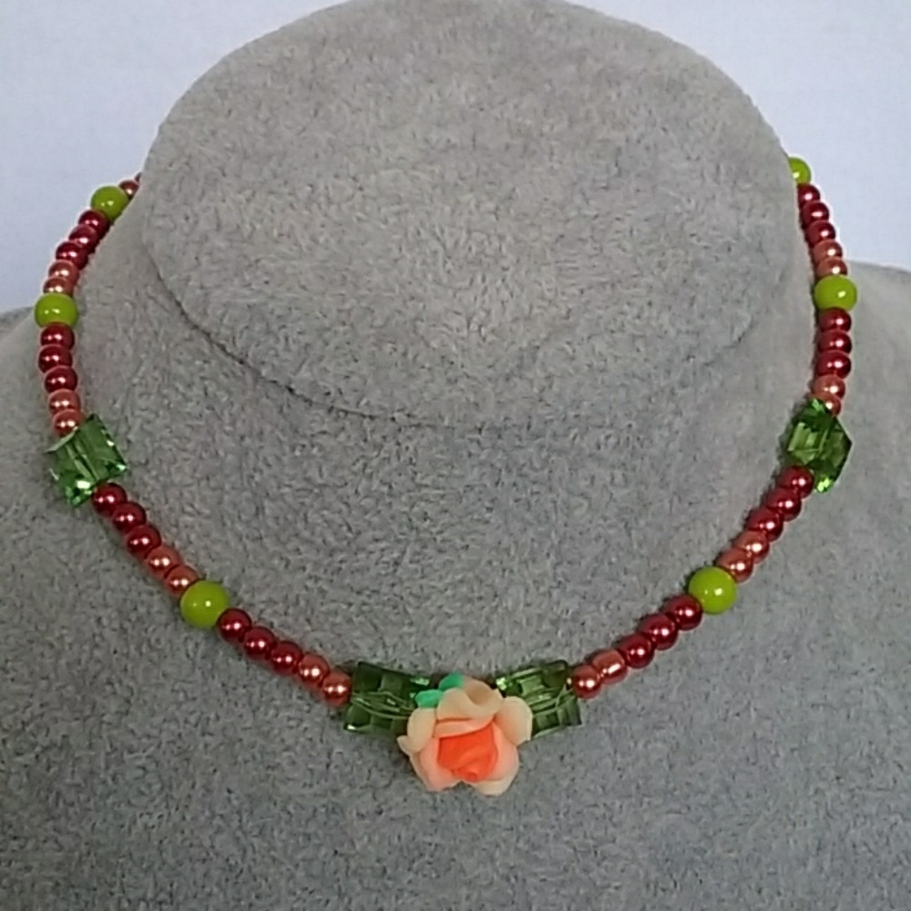 Girls beaded necklace with flower charm